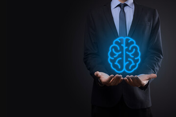 Businessman holding abstract brain and icon tools, device, customer network connection communication on virtual , innovative development future technology, science, innovation and business concept