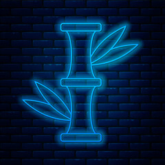 Wall Mural - Glowing neon line Bamboo icon isolated on brick wall background. Vector