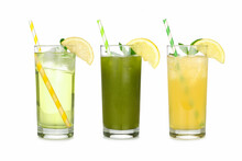 Group Of Summer Iced Green Teas In Glasses With Paper Straws Isolated On A White Background. Iced Green Tea, Iced Matcha Lemonade And Iced Green Tea Lemonade.