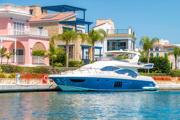 Yacht moored close to luxury residence at Limassol Marina, Cyprus