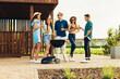 Group of happy young friends in summer clothes, Friends have fun, drinking drinks, Summer party