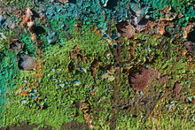 Old Metal Surface Covered With Corrosion And Decaying Paint.
