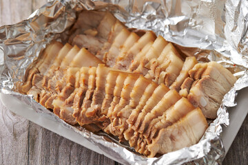 Wall Mural - Boiled pork on a plate, Korean food 