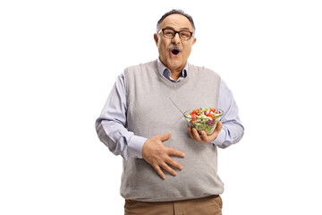 Canvas Print - Mature man with a salad holding his belly