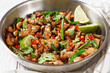 © myviewpoint - Thai cashew chicken stir fry in a pan