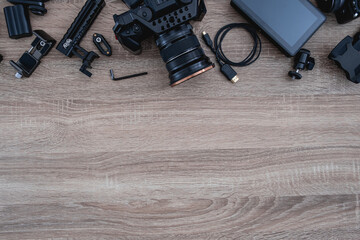 Wall Mural - top view of work space photographer with digital camera and camera accessory