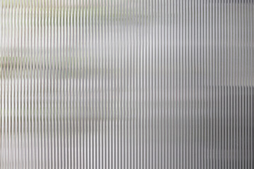 polycarbonate plastic background and texture. Transparent material Corrugated plastic surface use for partition wall or roofing.