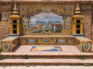 Wall Mural - bench in the plaza españa in seville, representing historical events in Albacete in Pisan tiles and with two towers of shelves on the sides.