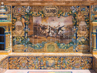 Wall Mural - bench in the plaza españa in seville, representing historical events in Madrid in Pisan tiles and with two towers of shelves on the sides.