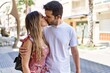 © Krakenimages.com - Young hispanic couple hugging in love at the city. Girlfriend and boyfriend together in love walking on the street