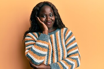 Sticker - African young woman wearing wool winter sweater thinking looking tired and bored with depression problems with crossed arms.