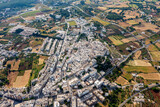 Fototapeta Miasta - Aerial view of Locorotondo un in Bari. a country in Puglia. Beautiful landscape