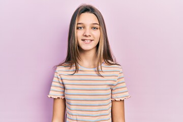 Sticker - Young brunette girl wearing casual striped t shirt with a happy and cool smile on face. lucky person.