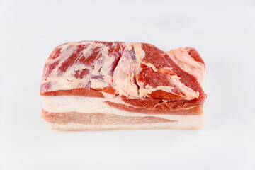 Wall Mural - Piece of pork belly isolated on white background.