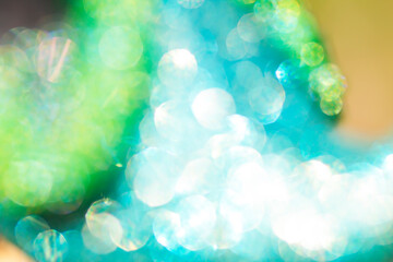 Green and blue bokeh abstract background.