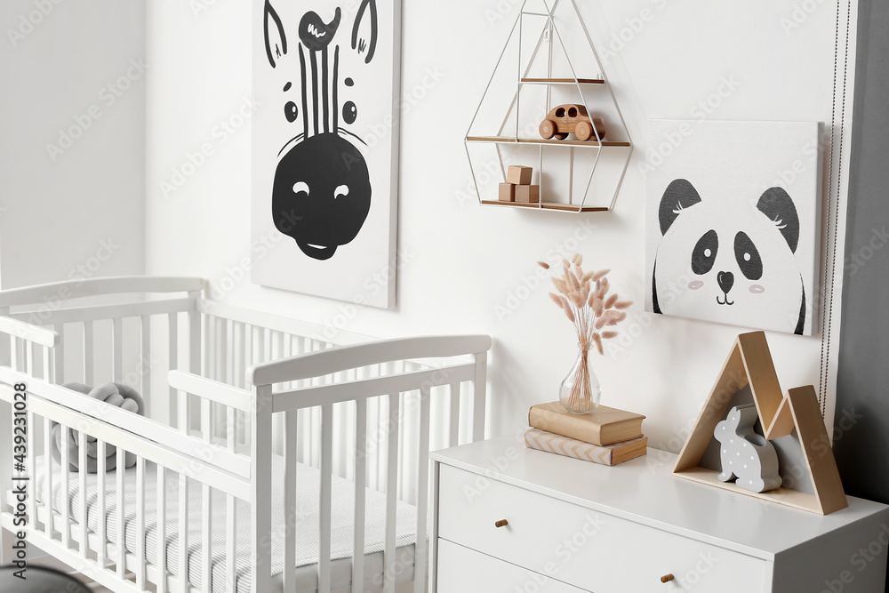 Interior of stylish children's room with comfortable bed