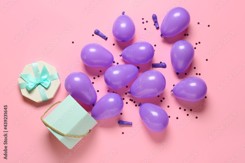 Festive composition with air balloons on color background