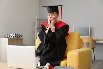 Sticker - Happy female student on her graduation day at home. Concept of studying online