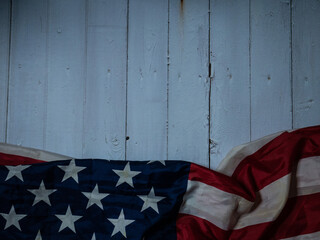 The  Flag of  United States of America  on natural wood table image for American freedom and Independence or Background with copy space concept.