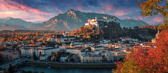 Aufkleber - Colorful evening cityscape. Panoramic view on historic city of Salzburg with famous Hohensalzburg Fortress. Wonderful autumn landscape with picturesque sky. Softlight effect. Salzburger Land, Austria