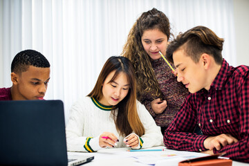 Wall Mural - Group of diverse students studying together