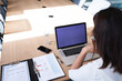 © Wavebreak Media - Caucasian businesswoman using laptop while sitting in meeting room at modern office
