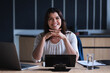 © Wavebreak Media - Portrait of caucasian businesswoman smiling while sitting in meeting room at modern office