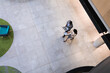 © Wavebreak Media - Overhead view of diverse businessman and businesswoman discussing together at modern office