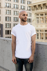 Wall Mural - Casual white t-shirt man in the city apparel shoot