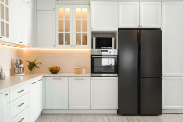 Sticker - Modern kitchen interior with stylish white furniture