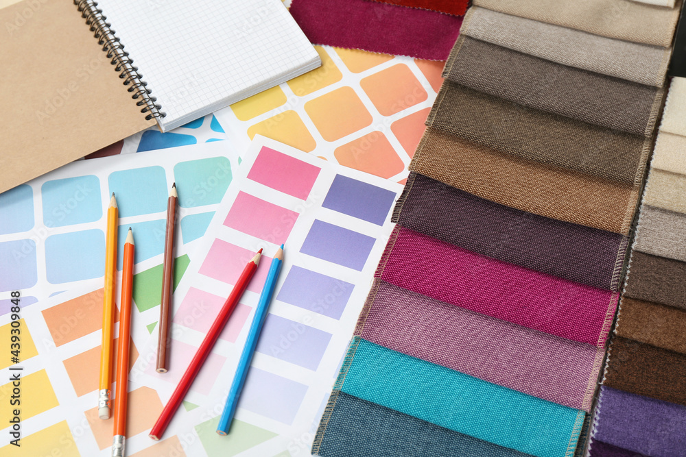 Upholstery fabric samples, pencils and color palette - obrazy, fototapety, plakaty 