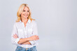 © denis_vermenko - Happy elegant mature senior business woman smiling standing isolated on white background. Smiling confident cheerful middle aged lady with white smile looking at camera, copy space.