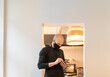 © Hernandez & Sorokina/Stocksy - Chef Holding Smartphone