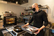 © Hernandez & Sorokina/Stocksy - Chef Working In The Kitchen