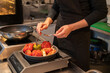 © Hernandez & Sorokina/Stocksy - Close Up Of Chef Baking Vegetables