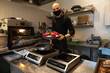 © Hernandez & Sorokina/Stocksy - Portrait Of Chef At Kitchen