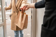 © Hernandez & Sorokina/Stocksy - Take Away At Cafeteria Doorway