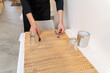 © Hernandez & Sorokina/Stocksy - Waiter Setting The Table