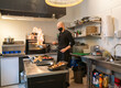 © Hernandez & Sorokina/Stocksy - Cook Working In The Kitchen