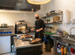 © Hernandez & Sorokina/Stocksy - Portrait Of Chef At Kitchen