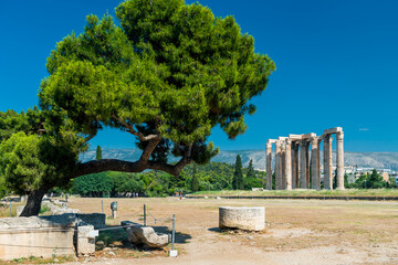 Wall Mural - Greek Olympian Zeus temple, landscape with ancient ruins in Athens, Greece