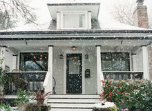 Classic Home In Snow Storm