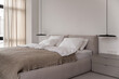 © Andriy Bezuglov/Stocksy - Interior of modern bedroom with white walls