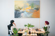 © Studio Marmellata/Stocksy - Content businesswomen working in creative home office
