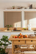 © BONNINSTUDIO/Stocksy - Modern kitchen with food and kitchenware