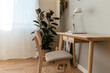 © BONNINSTUDIO/Stocksy - Interior of modern workplace at home