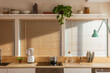 © BONNINSTUDIO/Stocksy - Modern kitchen with kitchenware
