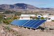 © Ivan Gener/Stocksy - Solar panels outside in the countryside