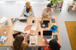 © Studio Marmellata/Stocksy - Diverse women talking during meeting in office