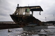 dismantling of old rusty ships in the winter